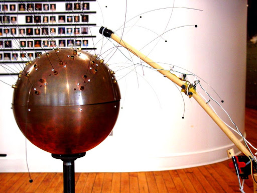 The arm turns Greg Shakar's COPPER URCHIN into a never-ending music box. The arm turns Greg Shakar's COPPER URCHIN into a never-ending music box.