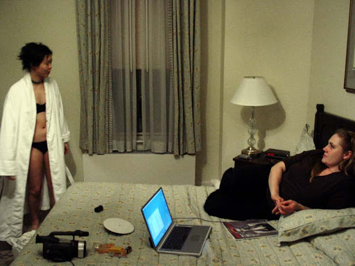 The photoshoot took place on Feb 27 at the Algonquin Hotel at 59 West 44th Street, a block from Time Square. Below, Ann gets comfortable in her robe while Alicia enjoys a theoretical discussion on contagious media. The photoshoot took place on Feb 27 at the Algonquin Hotel at 59 West 44th Street, a block from Time Square. Below, Ann gets comfortable in her robe while Alicia enjoys a theoretical discussion on contagious media.